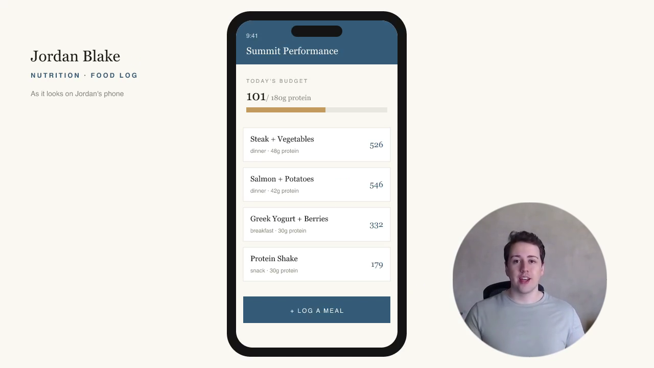 Check-in video frame: the coach talking beside the client's phone food log